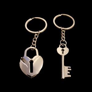 2/$20 brand new silver couple keychains